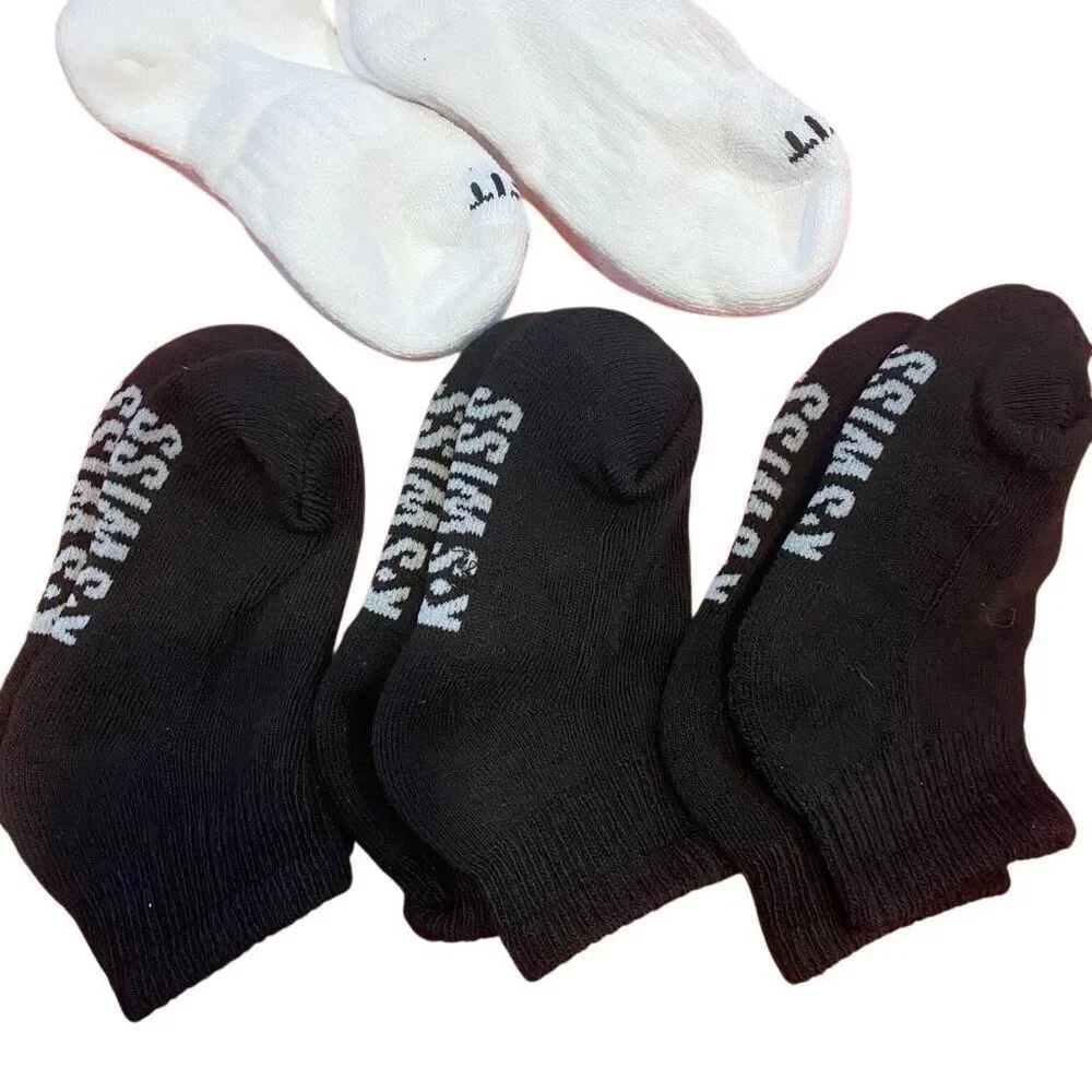 Nike 2 pair white and 3 pair of K- Swiss socks